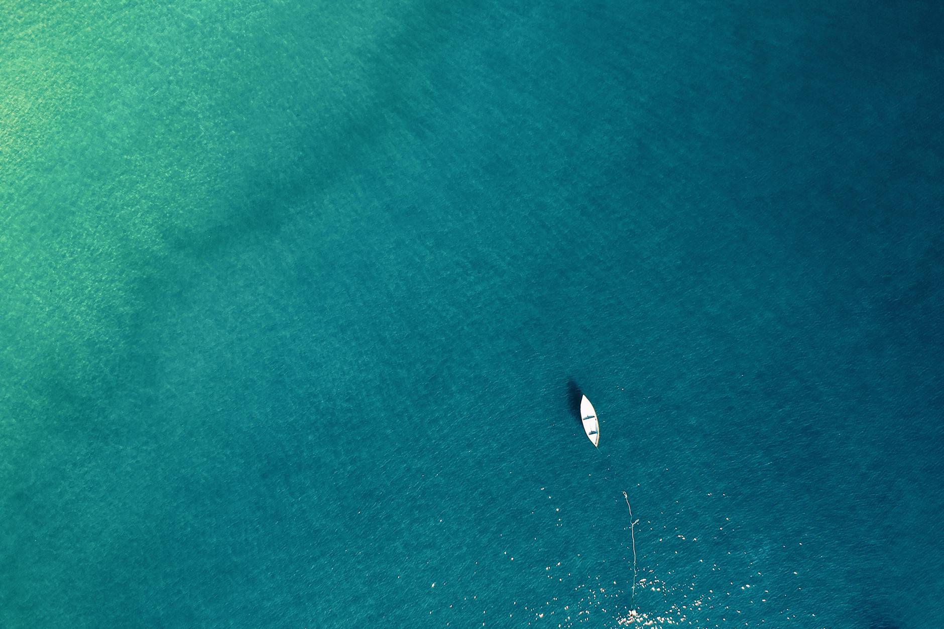 aerial photo of boat on sea